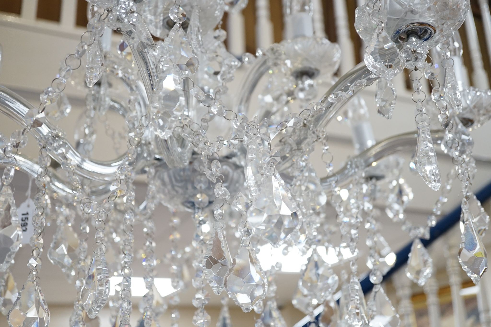 An 8 branch, 12 light chandelier
